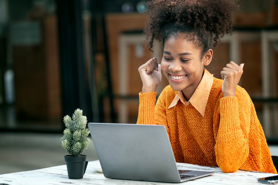 Decorative image of person using a laptop